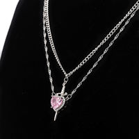 Collier tendance Cœur et Épée pour couple avec chaîne à maillons pour femme, pendentif romantique en alliage de zinc pour occasions festives
