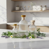 Bouteille diffuseur de parfum ronde en verre pour décoration intérieure 50ml/100ml/200ml avec bouchon en liège et impression sérigraphiée pour huile aromatique vide