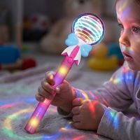 Bâton lumineux rotatif LED multicolore en plastique avec nœud rose magique pour filles - Cadeau pour événements et activités de team building