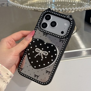 เคสโทรศัพท์ลายการ์ตูนคิตตี้รูปโบว์เพชรแบบใหม่ล่าสุดสำหรับสาวๆ วัสดุ TPU+อะคริลิค ป้องกันรอยนิ้วมือ กันกระแทก พร้อมกระจกแต่งหน้าแบบพับได้ - Product Image 2