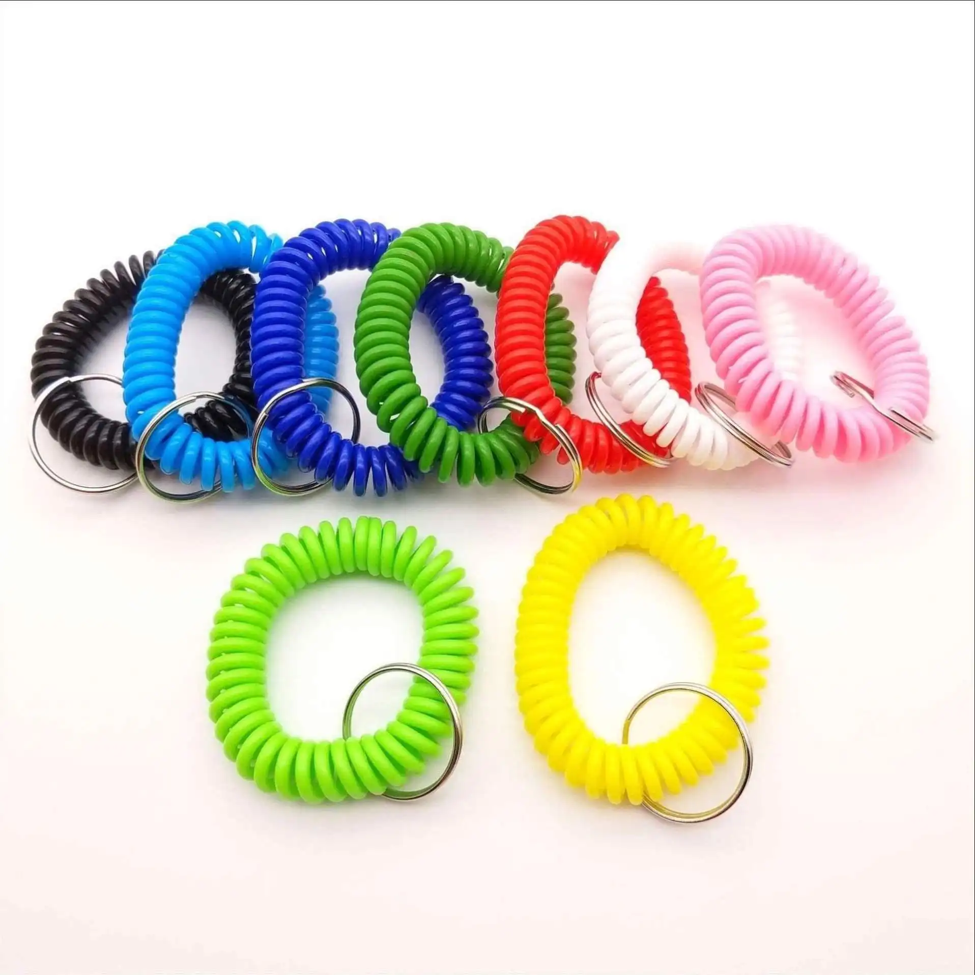 Personalizado colorido Flexible resorte espiral bobina impermeable muñequera llavero pulsera de plástico anillo retráctil resorte bobina llavero