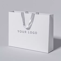 Sacs en papier blancs personnalisés de luxe, avec poignée en ruban, recyclables, biodégradables, emballage cadeau de haute qualité pour la promotion, logo