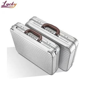 Étui rigide en aluminium de stockage argenté personnalisé avec boîte à outils de voyage d'affaires en mousse mallette métallique portable