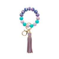 Bracelet en perles de silicone, porte-clés en perles de bois avec glands, accessoires de sac pour femmes