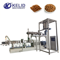 Machine de traitement d'aliments pour chiens Extrudeuse à double vis en acier inoxydable contrôlée par PLC pour ligne de production d'aliments secs pour animaux de compagnie