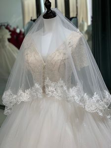 <span class=keywords><strong>Voile</strong></span> de style nouveau 2024, vente chaude à <span class=keywords><strong>bas</strong></span> prix, vente en gros, robes courtes en dentelle blanche pure pour femmes voilées, voiles de mariée pour mariage - Product Image 4