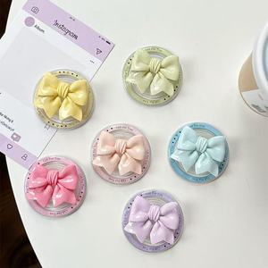 Bowknot Phone Grips Soporte de teléfono para <span class=keywords><strong>iPhone</strong></span> 17 16 15 Soporte de teléfono celular transparente plegable Accesorio Soporte magnético - Product Image 2