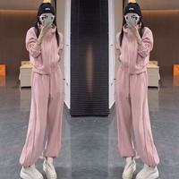 Ensemble de survêtement pour femmes européennes, couleur unie, sweat à capuche et pantalon plissé sur le côté, 2 pièces assorties