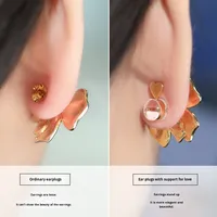 Boucles d'oreilles en silicone transparentes plaquées or de haute qualité avec logo personnalisé, fermoirs en laiton en forme de cœur pour boucles d'oreilles à clous