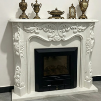 Manteau de cheminée en marbre blanc, directement de l'usine, avec un encadrement complexe sculpté à la main (acanthe et motifs floraux) pour la décoration résidentielle