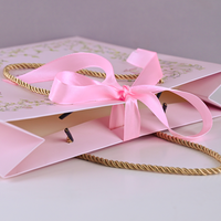 Sacs cadeaux en papier d'art recyclable rose de luxe avec logo personnalisé imprimé pour l'emballage de bougies et d'artisanat