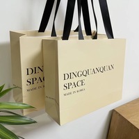 Sac à provisions pour femmes en carton blanc à la mode 10 pièces Carton pliable recyclable avec logo personnalisé gratuit pour chaussettes