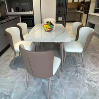 Table et chaises de salle à manger en pierre brillante importées d'Italie, style luxe léger, table de salle à manger italienne simple et moderne pour la maison
