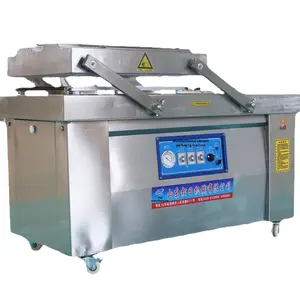Machine d'emballage <span class=keywords><strong>sous</strong></span> <span class=keywords><strong>vide</strong></span> électrique commerciale automatique à double chambre pour <span class=keywords><strong>charcuterie</strong></span> et poulet rôti 380V50HZ Matière en poudre - Product Image 1