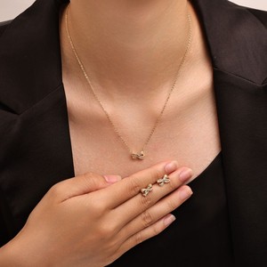 Conjunto de pendientes y collar con lazo de perlas brillantes, engaste de aleación de cobre, conjunto de joyería de moda de lujo para uso diario - Product Image 2