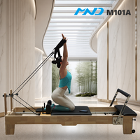Machine de Pilates en bois de caoutchouc durable avec noyau en caoutchouc, équipement de gym MND Fitness, matériel de studio de Pilates pour studio de gym à Londres, stable