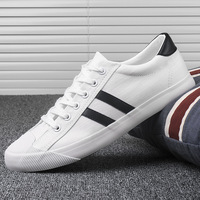 Vente en gros de chaussures en toile décontractées et classiques en caoutchouc de haute qualité avec logo à lacets pour hommes blancs