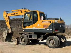 Excavatrice sur pneus Hyundai R150W-9 d'occasion avec moteur Hyundai, godet de 0,3 m³, 15 tonnes, CE 2022, roulement et pompe - Product Image 1