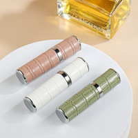 Nouveau design de luxe de haute qualité 5ml 10ml rond coloré torsion en cuir rechargeable vide poche vaporisateur atomiseur de parfum