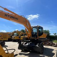 Excavatrice sur pneus hydraulique Hyundai R210w-9t d'occasion, moteur, pompe, boîte de vitesses, poids opérationnel de 21 tonnes, modèle 2024, bon état