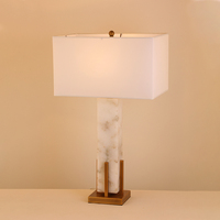 Lampe de table décorative en PVC E27 avec abat-jour cylindrique en albâtre naturel et cadre métallique contemporain de luxe pour salon et chevet