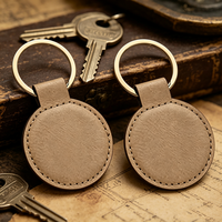 Porte-clés rond en cuir PU vierge pour gravure laser personnalisée, idéal pour cadeaux d'entreprise et promotionnels