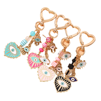 Nouveauté Porte-clés en alliage avec zircon et émail, motif Œil protecteur et Cœur, pour femmes, pendentif décoratif pour clés de voiture et sacs