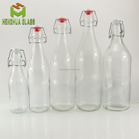 Bouteilles en verre rondes personnalisées par le fabricant, 250 ml, 500 ml, 750 ml, 1000 ml, avec bouchon à clip pivotant pour l'eau, les jus, les boissons, l'huile, les spiritueux