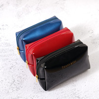 Pochette de maquillage tendance en cuir PU brillant et lisse pour femmes, organiseur à fermeture éclair, trousse de toilette, designs personnalisés, écologique