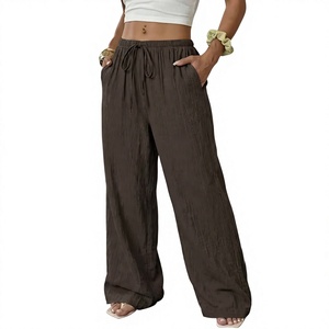 Pantalon en lin taille haute pour femme, coupe ample, couleur unie, respirant, brodé, avec cordon de serrage, décontracté, pour l'été et la plage - Product Image 1