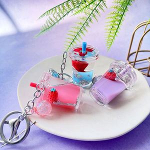 Factory Wholesale <b>Cute</b> Unicorn Bottle Keyholder Floating Keychain with Milk Tea Liquid Made of Zinc Alloy Plastic for <b>Keyring</b> - Product Image 3