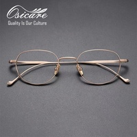 Gafas de titanio puro de diseño minimalista, montura óptica dorada, lentes de metal al por mayor, gafas para hombre pequeñas IP