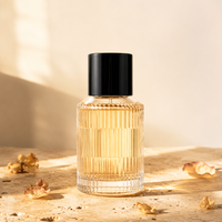 Venta al por Mayor, Stock Disponible, Marca HUAFAN, Botellas de Perfume de Vidrio Transparente Cilíndricas de 30ml/50ml/100ml, Tapas Negras, Pulverizador con Bomba
