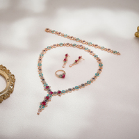 Ensemble de bijoux baroque en zircon coloré, collier, boucles d'oreilles, bagues, bracelet, or rose, rubis, élégant, pour soirée dansante, occasion formelle, bijoux pour femme