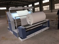 Machine d'inspection de tissu et machine à rouler les tissus