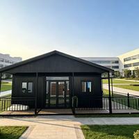 Maison conteneur modulaire préfabriquée isolée à double aile extensible, résistante aux intempéries, pour zones froides et enneigées