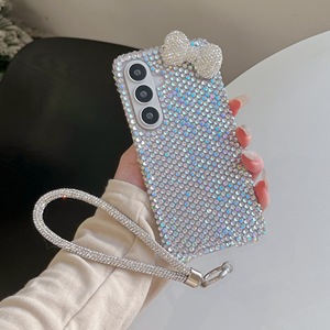 <span class=keywords><strong>Coque</strong></span> <span class=keywords><strong>de</strong></span> <span class=keywords><strong>téléphone</strong></span> rigide en PC avec nœud papillon scintillant et diamant pour <span class=keywords><strong>Samsung</strong></span> Galaxy S26 S25 S24 Plus S23 Ultra, avec bracelet <span class=keywords><strong>de</strong></span> poignet mignon - Product Image 6