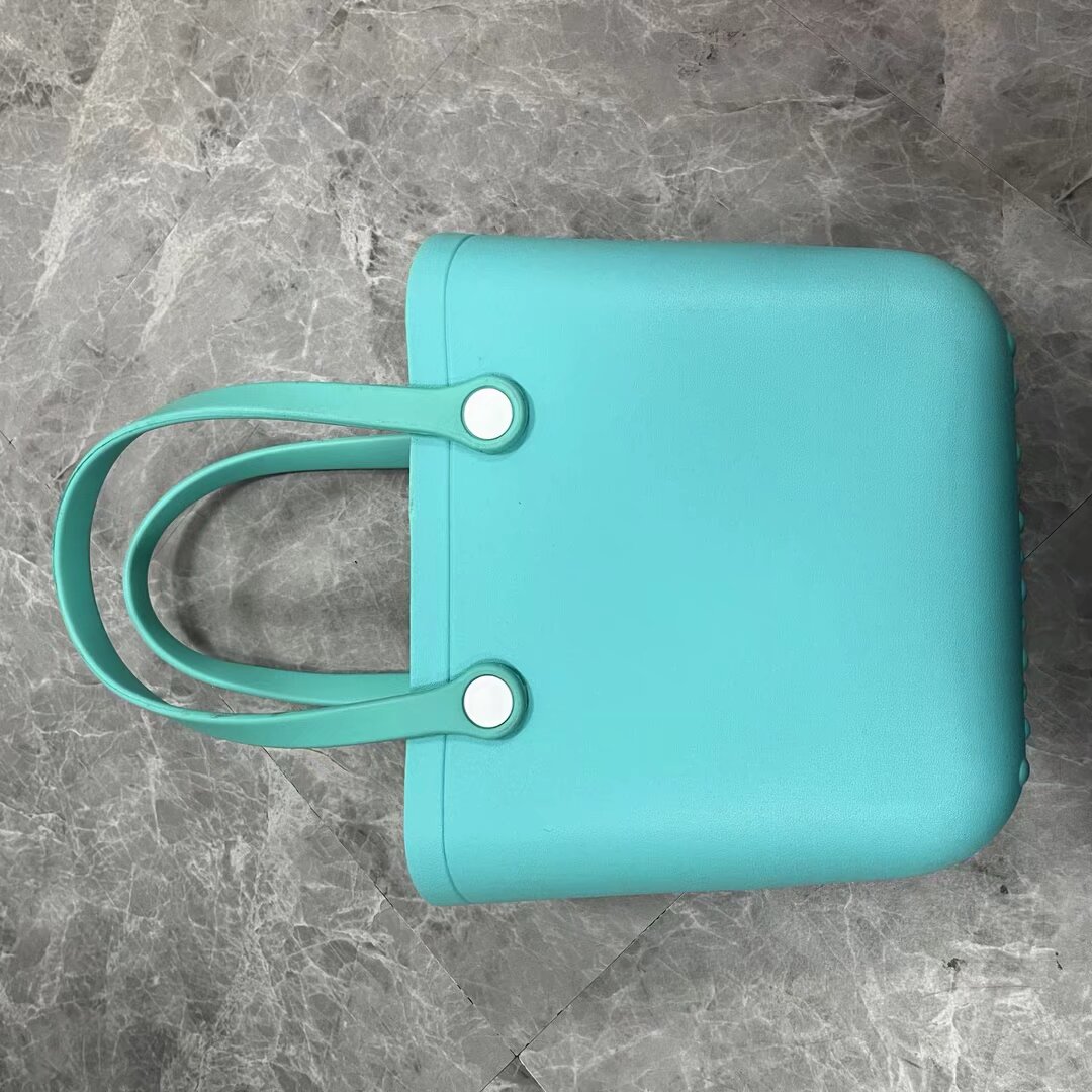 teal blue-bag body with eva handles and with 1 side holes