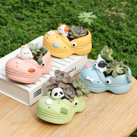 Pot de fleurs en résine en forme de botte mignon de dessin animé avec logo personnalisé et pot de succulente en résine animale pour la décoration de jardin à la maison