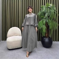 Set 2 Potong Warna Biru Debu Musim Gugur 2026 Grosir, Blus Kerah Mandarin Berumbai dan Rok Maxi A-Line yang Mengembang, Elegan untuk Wanita