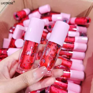 Nhãn hiệu riêng trái cây Plumping môi dầu dưỡng ẩm lỏng Vegan Lip Gloss Balm nhãn hiệu riêng Hyaluronic Vegan Lip Gloss