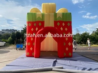 Boîte cadeau gonflable géante en forme de maison de Noël pour la publicité extérieure de Noël