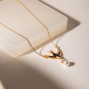 Ensemble de bijoux en acier inoxydable émaillé avec collier et boucles d'oreilles en forme d'hirondelle et de perle, résistant à l'eau, pour femmes <span class=keywords><strong>T669</strong></span> - Product Image 2