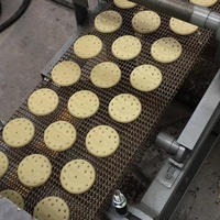 Machine automatique de fabrication de mini-biscuits