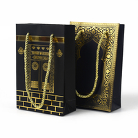 Sac cadeau en carton noir mat épais avec logo personnalisé pour l'emballage de vêtements et de produits de vente au détail