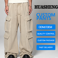 Vente directe d'usine hommes Baggy Cargo pantalons de survêtement couleur foncée froissé respirant hommes Cargo pantalon avec poche décoration
