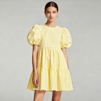 Robe décontractée pour femmes, fabriquée sur mesure par des fabricants de vêtements, avec manches bouffantes larges, col rond et jupe courte, couleur unie
