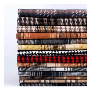 Tessuto a quadri scozzese a quadri camicie di tacchino indumenti da notte tinto in filo 65% poliestere 35% cotone camicia di flanella tessuto per abbigliamento da lavoro uniforme