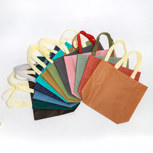 Özel Logo Mix renk dayanıklı kullanımlık geri dönüşüm geri dönüşümlü kalın dokunmamış olmayan dokuma ambalaj alışveriş butik için hediyelik alışveriş çantası - Product Image 1