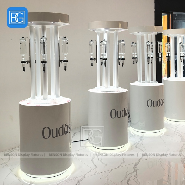 Luxury Painted Finish Cylindrical Retail Display Stand LED Illuminated Perfume Bottle Display Fixture